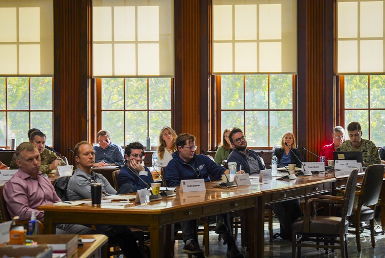 A group of people sitting at a table